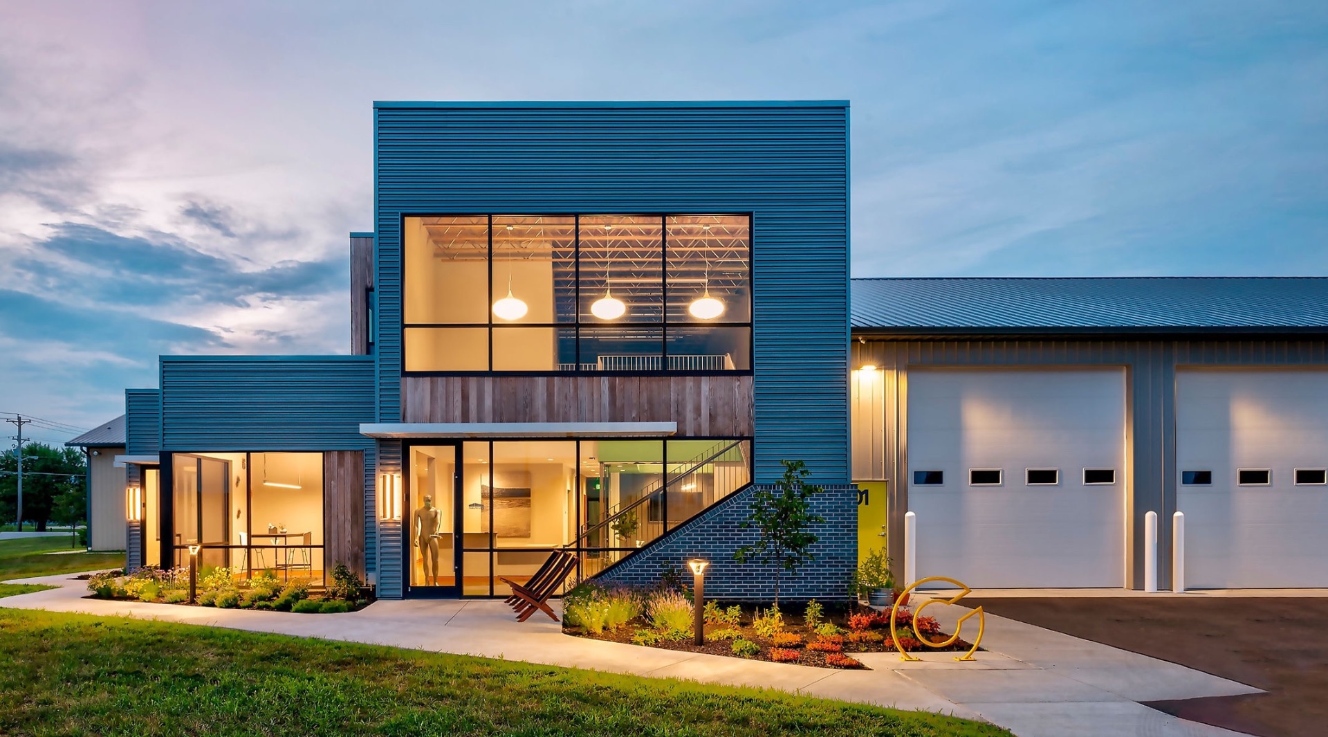 Exterior of the Wild Bramble studio building at dusk