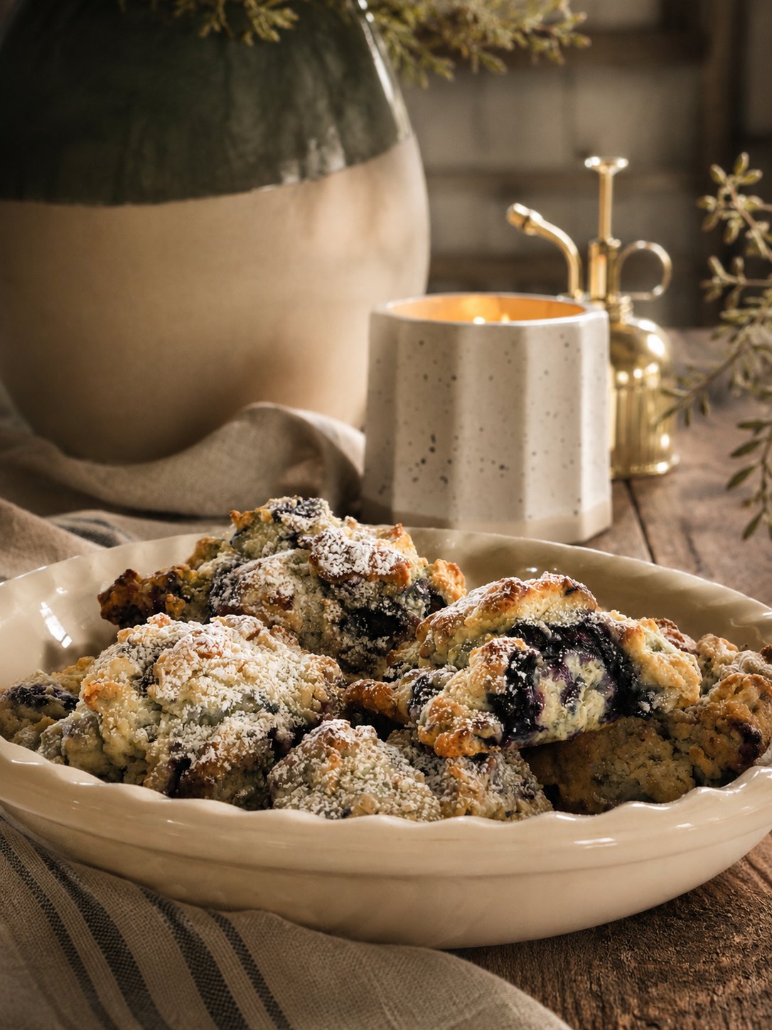 Warm blueberry scones dusted with powdered sugar
